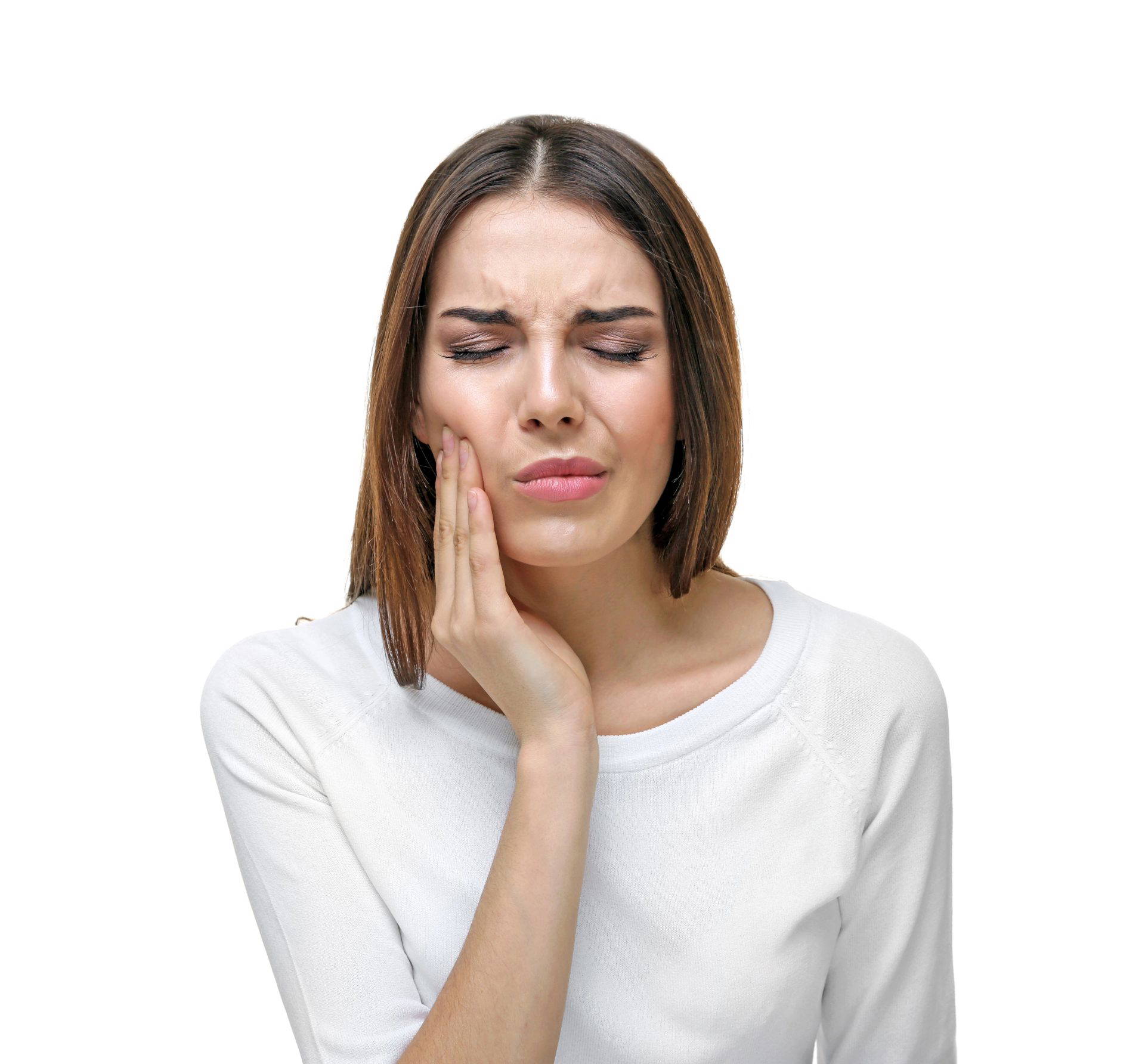 Woman holding her jaw in pain due to a toothache